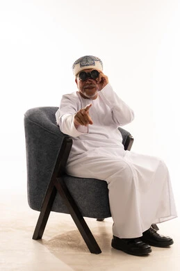 Omani Man with Binoculars in Traditional Dress