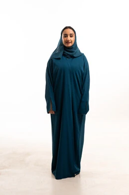 Emirati Woman in Teal Abaya on White Background