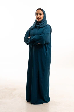 Saudi Woman in Teal Abaya and Hijab Studio Portrait