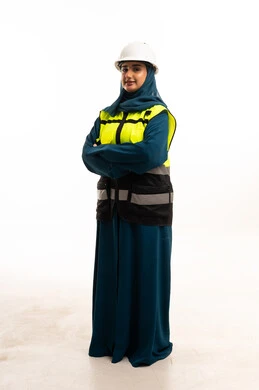 Emirati Female Engineer in Safety Gear and Abaya