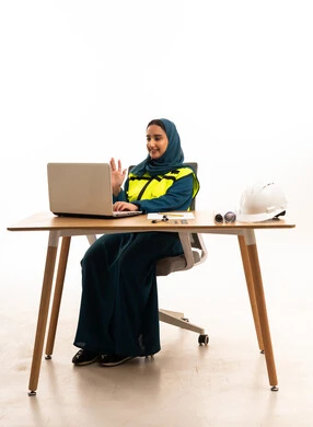 Saudi Female Engineer with Laptop and Safety Gear