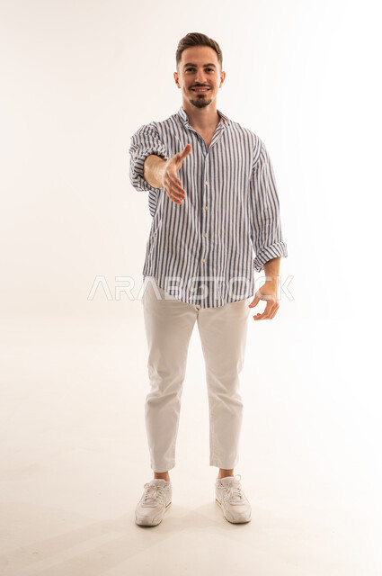 Saudi Man Extending Hand for Handshake on White Background