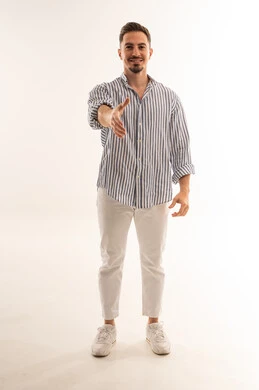 Saudi Man Extending Hand for Handshake on White Background