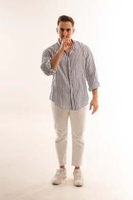 Saudi Man Making Silence Hush Gesture in Studio