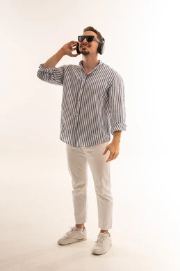 Saudi Man with Headphones and Sunglasses in Studio