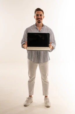 Saudi Man Holding Laptop on White Background
