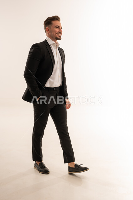 Saudi Businessman in Formal Suit Walking in Studio
