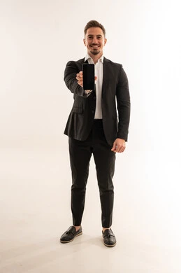 Saudi Businessman Holding Smartphone on White Background