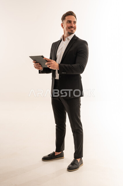 Saudi Businessman with Digital Tablet in Studio