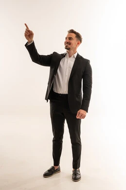 Saudi Businessman Pointing Up on White Background