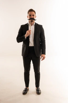 Saudi Businessman with Paper Mustache Prop in Studio