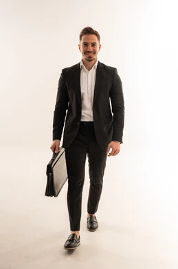 Saudi Businessman Walking with Briefcase on White Background