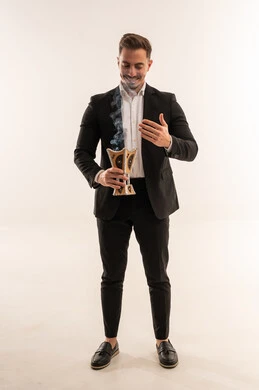 Saudi Man in Suit Holding Traditional Incense Burner