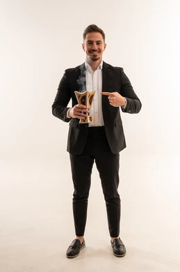 Saudi Man in Suit Holding Traditional Incense Burner