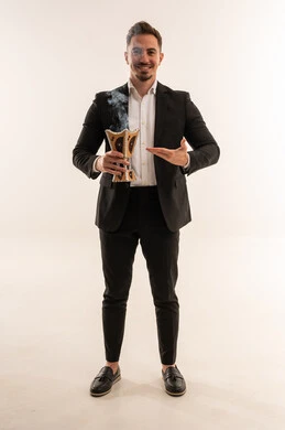 Saudi Man in Suit Holding Traditional Incense Burner