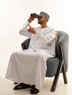 Omani Man with Binoculars in Traditional Clothing