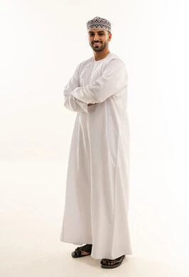 Omani Man in Traditional Dishdasha and Kummah