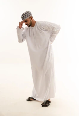 Omani Man in Traditional Dress with Physical Pain