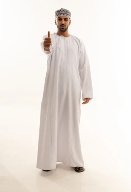 Omani Man in Traditional Dishdasha and Kummah