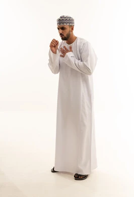 Omani Man in Traditional Dress Coughing on White Background