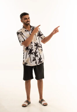 Saudi Man in Summer Shirt Pointing to Side