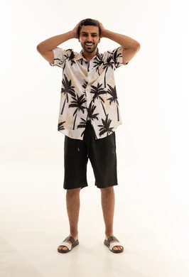 Smiling Arab Man in Summer Outfit Studio Shot