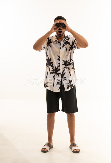 Arab Man Looking Through Binoculars on White Background