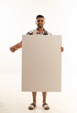 Arab Man Holding Blank White Board Advertising Space