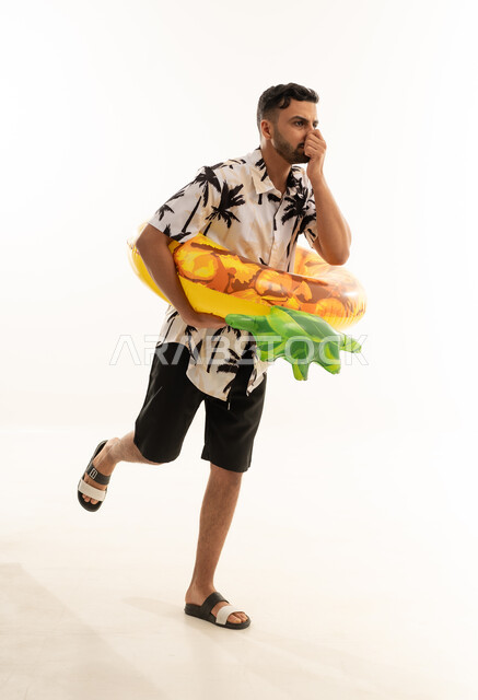 Saudi Man in Summer Clothes with Inflatable Ring