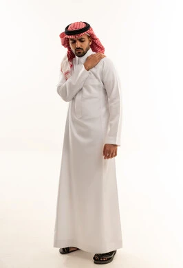 Saudi Man in Thobe with Shoulder Pain on White Background