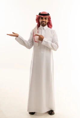 Saudi Man in Traditional Thobe Pointing on White Background