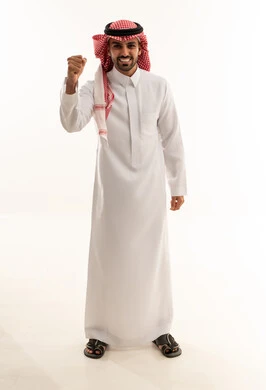 Saudi Man in Traditional Thobe Celebrating Victory
