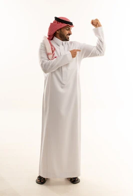 Saudi Man in Traditional Thobe Flexing Bicep