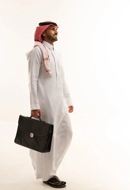 Saudi Businessman in Traditional Thobe with Briefcase