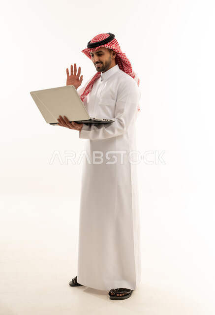 Saudi Man Holding Laptop Waving on White Background