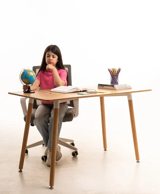 Saudi Girl Studying with Globe at Wooden Desk
