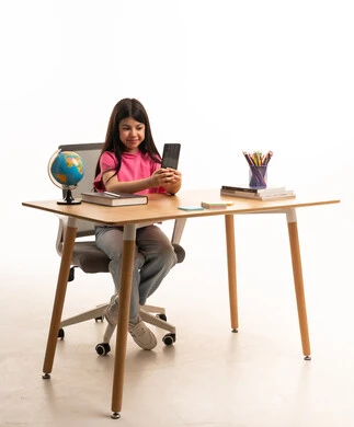 Arab Girl Using Smartphone at Desk with Globe
