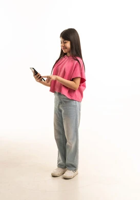 Young Saudi Girl Using Smartphone on White Background