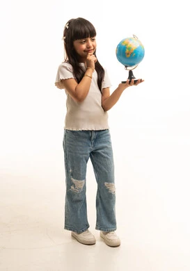 Saudi Girl Holding Terrestrial Globe in Thinking Pose