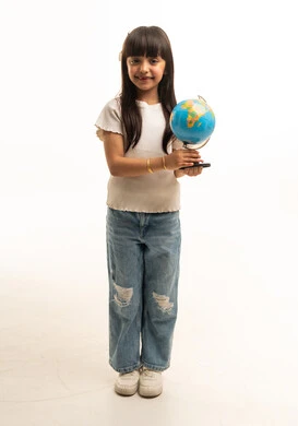 Saudi Girl Holding Globe on White Background