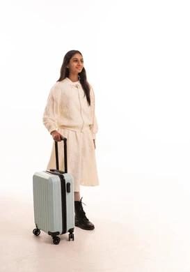 Arab Girl with Suitcase on White Background Studio Shot
