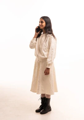 Saudi Girl Talking on Mobile Phone in Studio