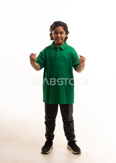 Saudi Boy Celebrating Success on White Background