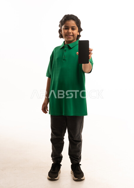 Saudi Boy Holding Smartphone Screen on White Background