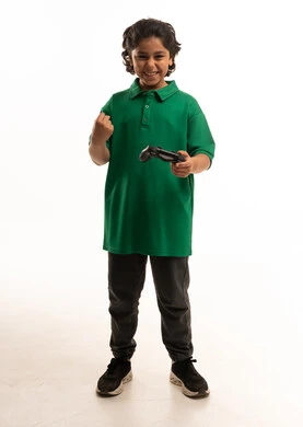 Saudi Boy Holding Game Controller on White Background