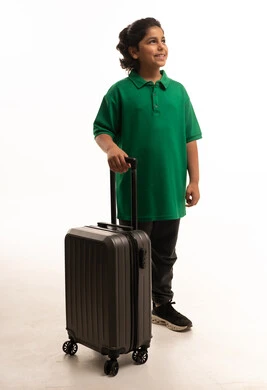 Arab Boy with Grey Travel Suitcase on White Background