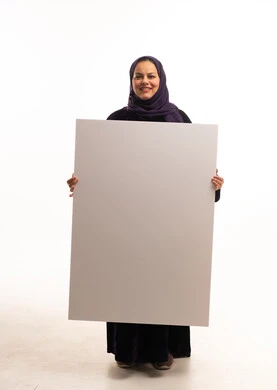 Saudi Woman Holding Large Blank White Sign in Studio