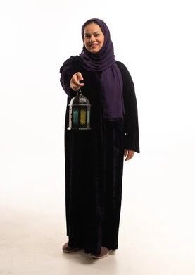 Saudi Woman in Abaya Holding Ramadan Lantern