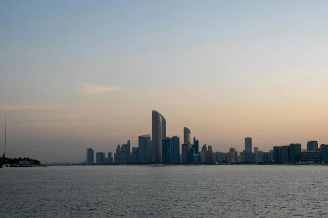 Abu Dhabi City Skyline and Skyscrapers at Dusk