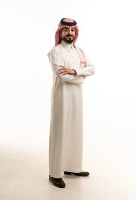 Saudi Man in Traditional White Thobe and Shemagh